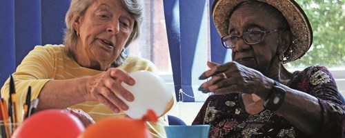 Older people enjoying an art project